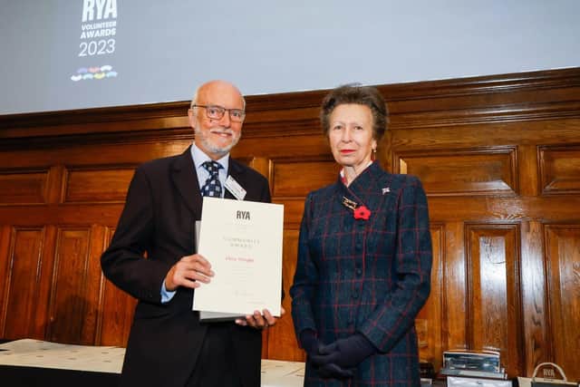 Pictured: Chris Wright receives his RYA Volunteer Award from HRH Princess Anne
