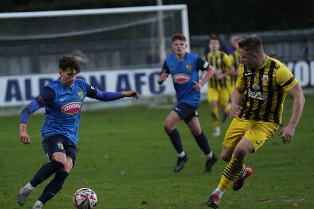 Oli Norman, left, netted Tadcaster's second goal of the game.