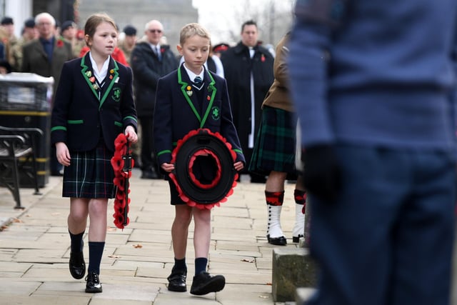 Pupils from Highfield Prep School lay their wreath as part of the Remembrance Day parade and service at the cenotaph