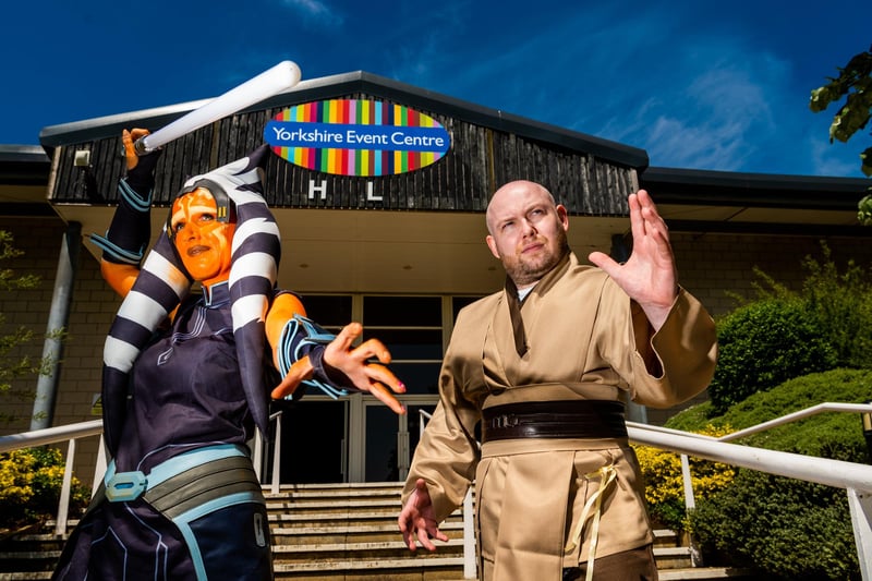 Naomi Harrison dressed as Ahosoka with Andrew Brady dressed as a Jedi, from Star Wars.