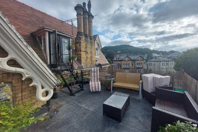 This penthouse has a roof terrace with views stretching to Oliver's Mount, and there is a communal garden.