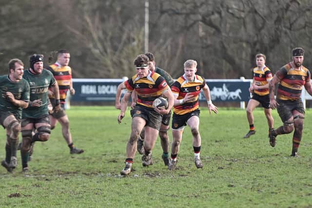 Ewan Evans on his way to registering Harrogate's sixth and final try of the afternoon. Picture: Daniel Kerr