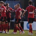 Knaresborough Town players celebrate after taking the lead during their 4-0 home win over local rivals Tadcaster Albion. Pictures: Gerard Binks