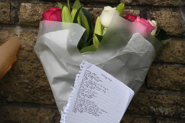 Flowers and messages at the Cenotaph in Harrogate.