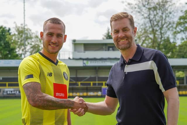Joe Mattock, left, is welcomed to Wetherby Road by Harrogate Town manager Simon Weaver. Picture: Harrogate Town AFC