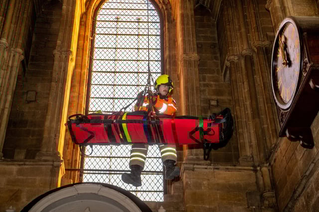 Verger Lucinda Taylor was strapped onto a stretcher and lowered 15 metres down to the cathedral floor from a trap door in the ringing room