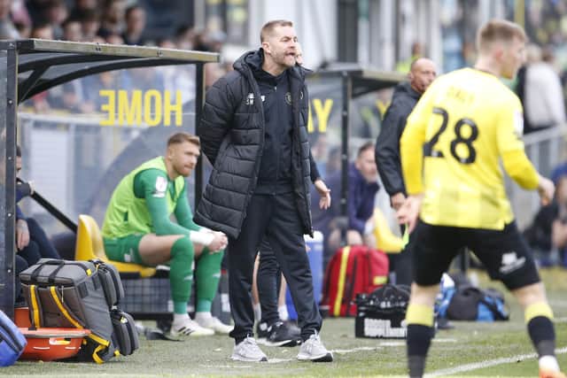 Harrogate Town manager Simon Weaver watches on from the sidelines during Saturday's 1-1 draw with Tranmere Rovers at the EnviroVent Stadium.