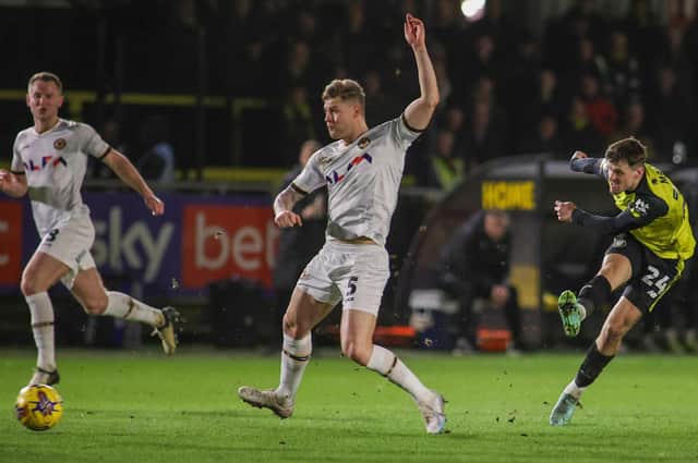 Josh March takes aim at goal during Harrogate Town's 4-1 home defeat to Newport County. Picture: Matt Kirkham