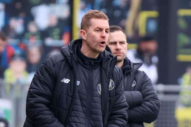 Harrogate Town manager Simon Weaver watches on from the sidelines during Saturday's goalless draw with Gillingham.