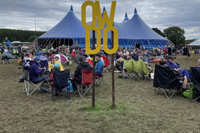 Enjoying the festival under glowering skies
