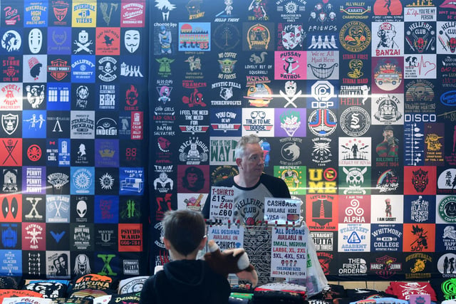 Visitors to Comic Con Yorkshire checking out the huge t-shirt stall that is on offer