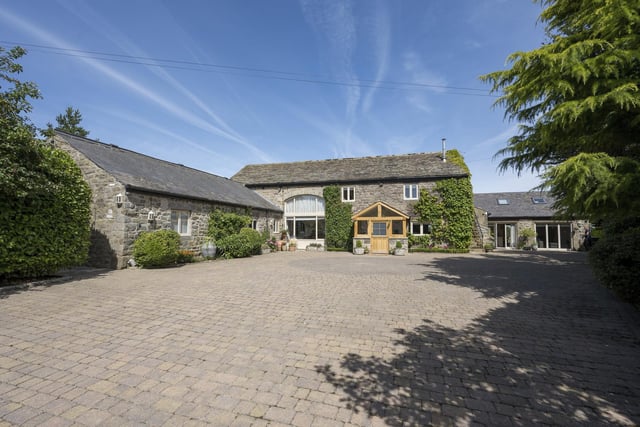 The approach to the £2.25m barn conversion that is currently for sale with Savills.