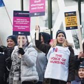 Nurses braving freezing temperatures to form a picket line.