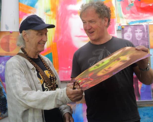 Exclusive new artwork courtesy of Harrogate art gallery and Gibson Garage - Kinks' co-founder Dave Davies, left, with artist Christian Furr. (Picture contributed)