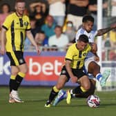 Harrogate Town captain Josh Falkingham in pre-season action against Leeds United. Picture: Paul Thompson/ProSportsImages