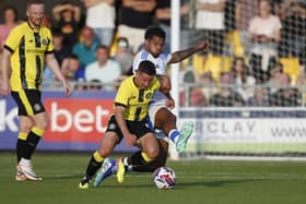 Harrogate Town captain Josh Falkingham in pre-season action against Leeds United. Picture: Paul Thompson/ProSportsImages