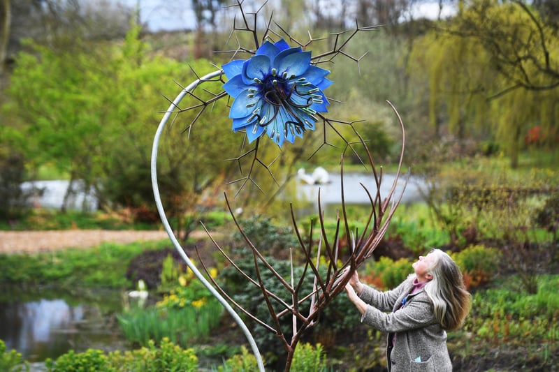 Sasha Jackson-Brown with one of the sculptures on display at the Himalayan Garden & Sculpture Park in Ripon