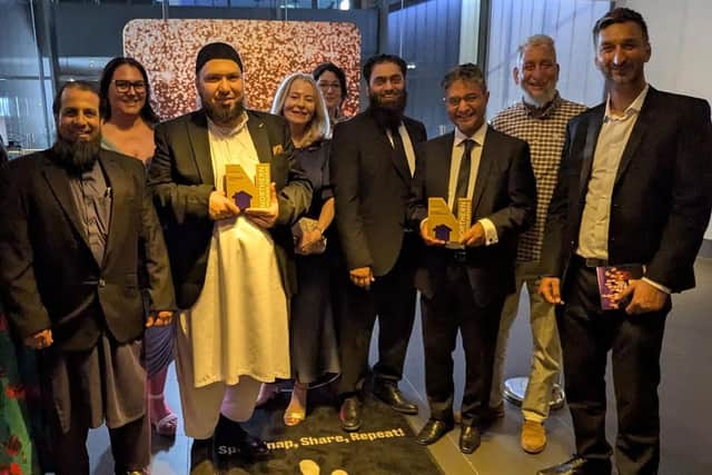 Manningham Housing Association representatives including Tenant of the Year Tausif Mohammed (fourth from left) with their Northern Housing Awards
