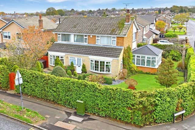 The house is on an attractive corner plot made private by mature hedging.