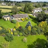 The bungalow within its magnificent surroundings.
