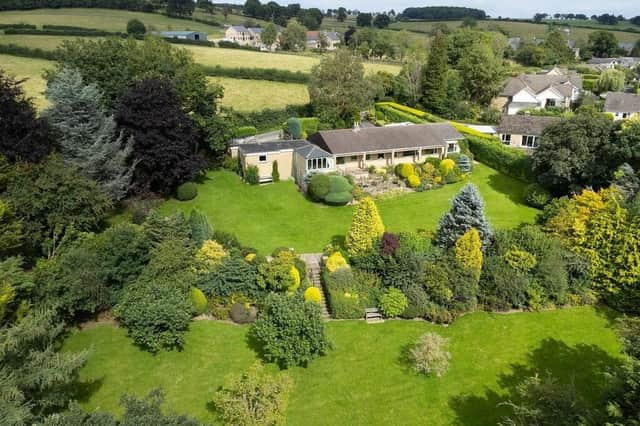 The bungalow within its magnificent surroundings.