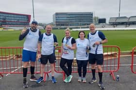 Harrogate fire and ambulance crew members pictured after successfully completing the Manchester Marathon and fundraising for Mind in Harrogate District.