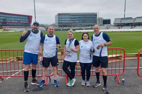 Harrogate fire and ambulance crew members pictured after successfully completing the Manchester Marathon and fundraising for Mind in Harrogate District.