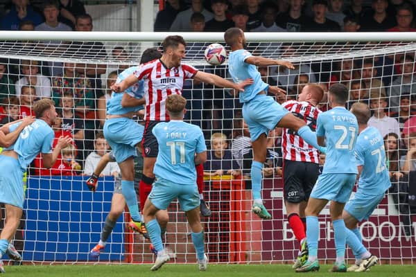 Tom Bradbury heads home the winning goal during Cheltenham's 1-0 home victory over Harrogate Town in September 2024. Picture: Matt Kirkham