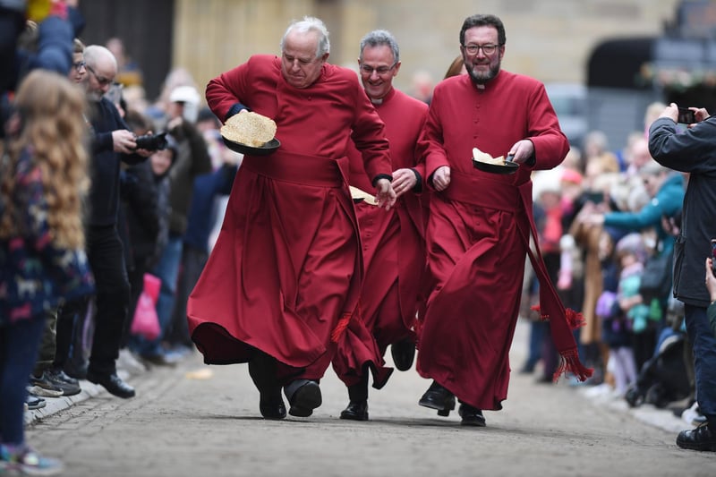 The Favourable Clive Mansel and Canon Matthew Pollard lead the clergy race and show their pancake flipping skills.
