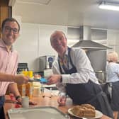 Harrogate and Knaresborough MP Tom Gordon MP, left, helps out at the Harrogate Homeless Project fundraiser with HHP chief executive Richard Cooper. (Picture contributed)