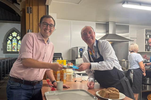 Harrogate and Knaresborough MP Tom Gordon MP, left, helps out at the Harrogate Homeless Project fundraiser with HHP chief executive Richard Cooper. (Picture contributed)