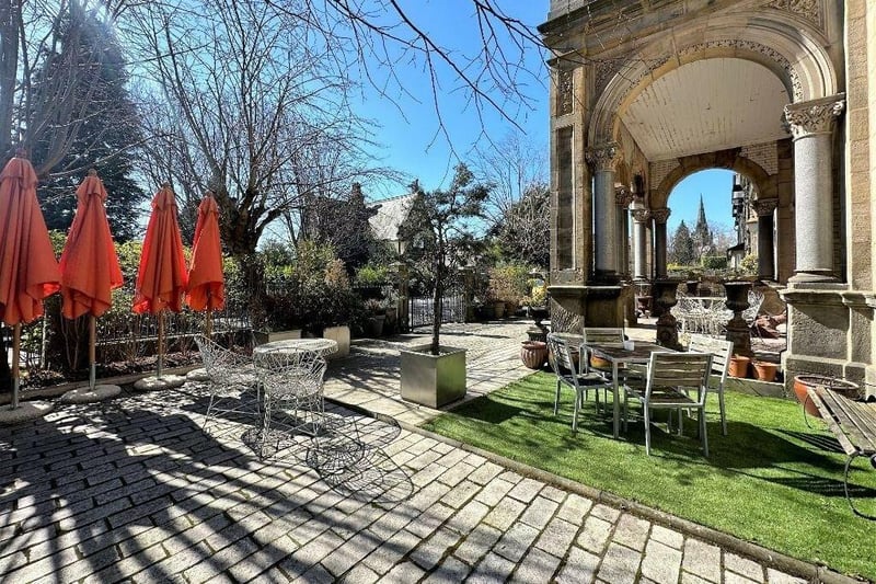 A stunning, south-facing courtyard garden lies to the front of the property.