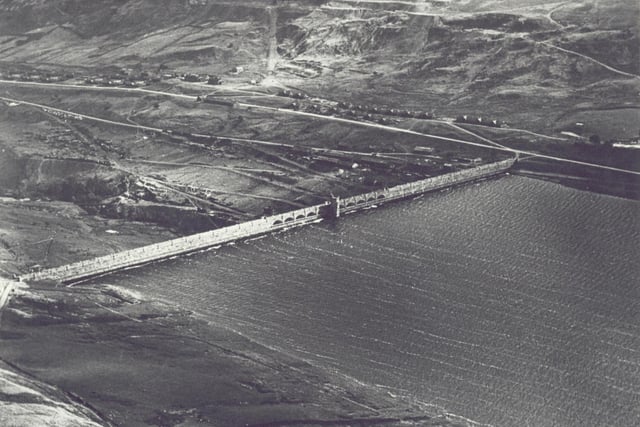 Scar Reservoir from above in 1935. Note the village on the far side and the tracks zig-zagging down into the bottom of the damn.