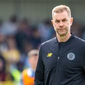 Harrogate Town manager Simon Weaver was far from happy as he headed into the home changing room during the half-time interval of Saturday's League Two clash with Grimsby. Pictures: Jez Tighe/ProSportsImages