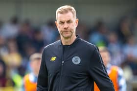 Harrogate Town manager Simon Weaver was far from happy as he headed into the home changing room during the half-time interval of Saturday's League Two clash with Grimsby. Pictures: Jez Tighe/ProSportsImages