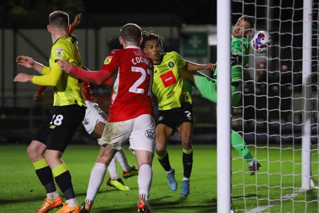 Miles Welch-Hayes forces home Harrogate Town's 96th-minute winner during Tuesday night's 2-1 EFL Trophy Group A victory over Morecambe.