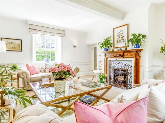 This stunning reception room has a feature fireplace.