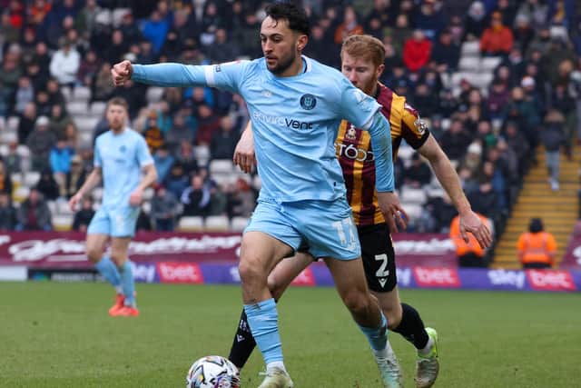 Levi Sutton limped off shortly after half-time as Harrogate Town suffered a 1-0 defeat on the road at Bradford City.