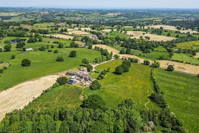 An aerial view of the property and its rural surroundings.