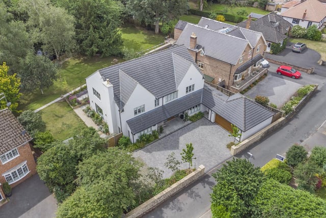 An aerial view of the property, that has a private, south-facing garden.
