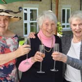 Home owners Roslyn Greenwood, Lesley Smith and Sheila Whitfield enjoy the party.