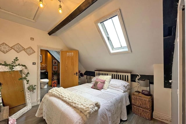 The second double bedroom similarly has a skylight, is spacious, and has additional fitted wardrobes.