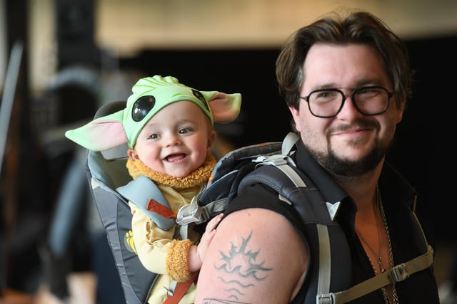 Callum Brown and his son Flynn (aged eight months) dressed as Yoda exploring Comic Con Yorkshire