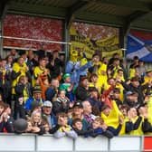 Harrogate Town's travelling support at Salford City included a number of fans dressed as bananas. Pictures: Matt Kirkham