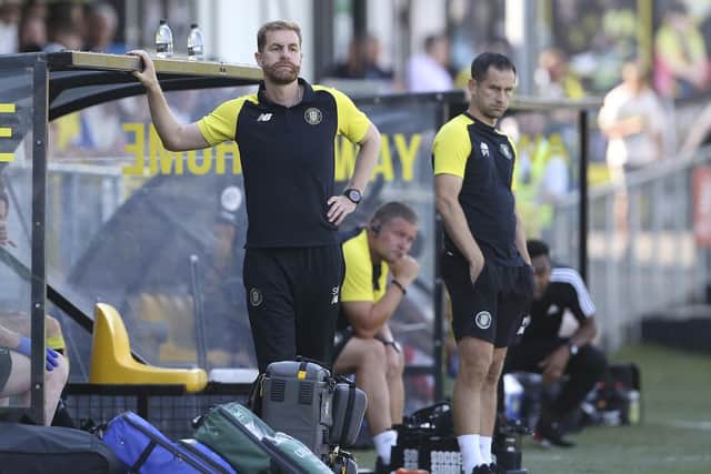 Harrogate Town manager Simon Weaver, left, and his assistant, Paul Thirlwell, watch on from their technical area during Saturday's League Two stalemate at home to Crawley.
