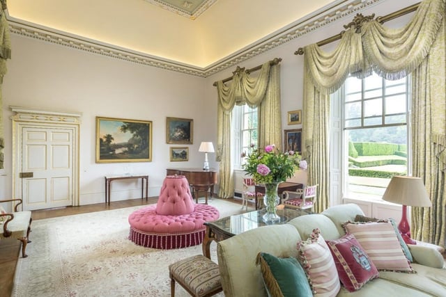 Features throughout include high ceilings with intricate plaster work, panelling, detailed cornicing, carved door surrounds, working shutters, and elegant sash windows.