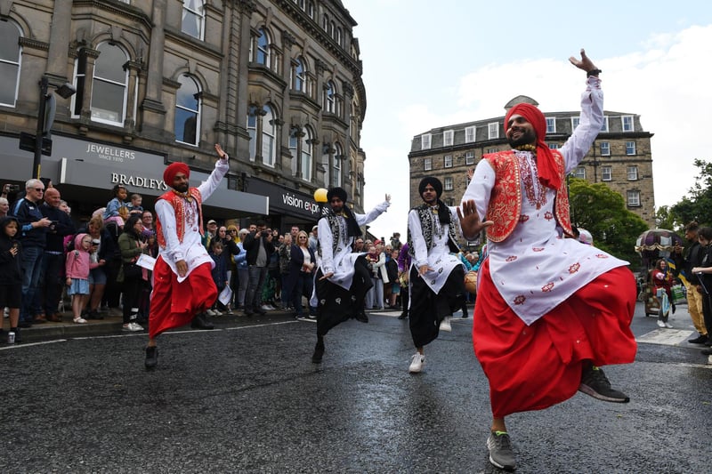 The Punjabi Roots dancers in the street parade as it made its way through the centre of Harrogate towards the Valley Gardens