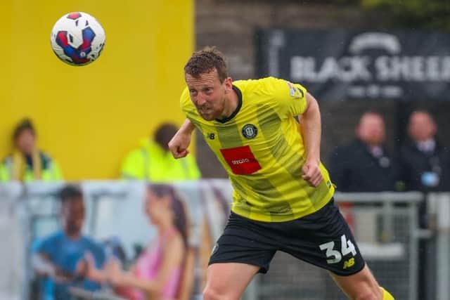 Harrogate Town hope to land centre-half Tom Eastman on a permanent contract following his release by League Two rivals Colchester United.