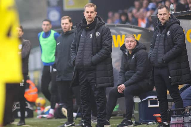 Sulphurites boss Simon Weaver watches on from his technical area.