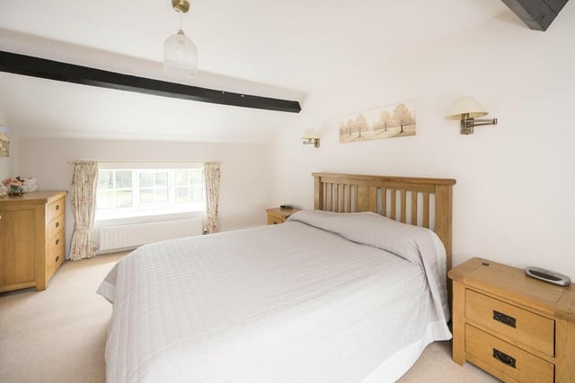 This beamed double bedroom is one of the three first floor bedrooms.